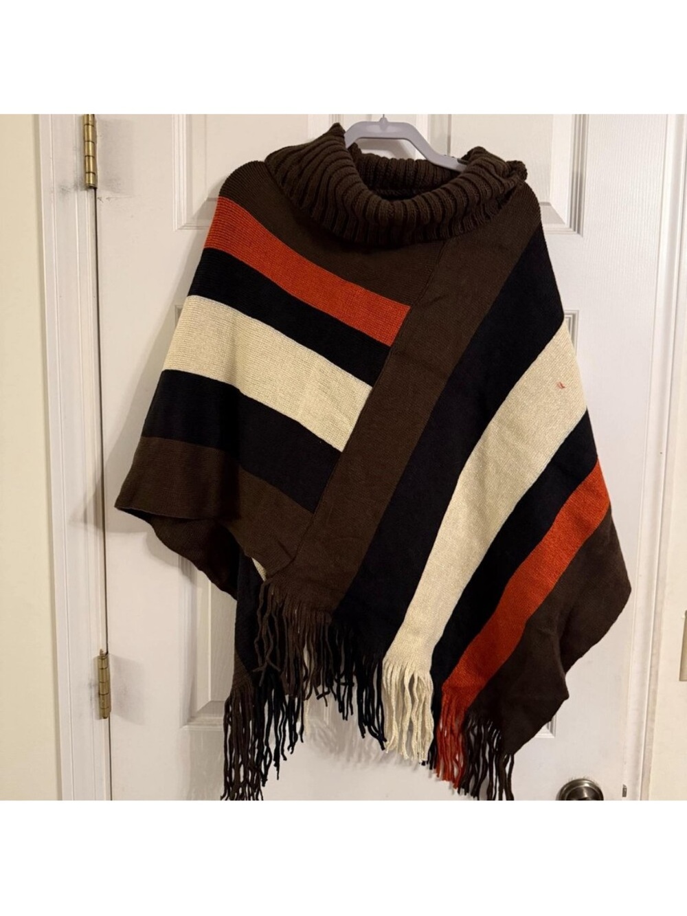 Striped Brown Fringe Knit Poncho with Turtleneck
18-02